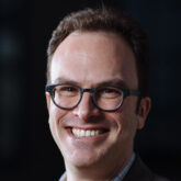 headshot of Jesse Thaler
