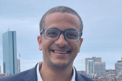 Mohamed Abdelhafez poses with two awards