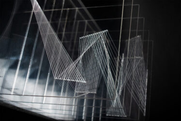 A layered sculpture resembling zig-zag patterns and geometric shapes