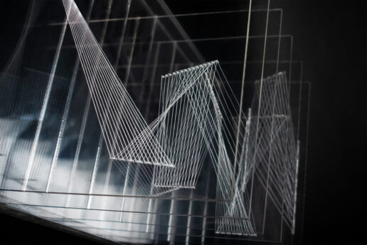 A layered sculpture resembling zig-zag patterns and geometric shapes